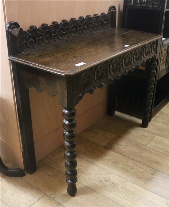 A Victorian carved oak hall table, W.104cm